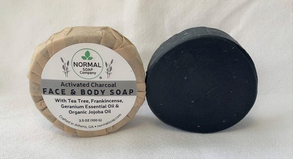 Activated Charcoal Face Soap featuring Tea Tree & Geranium Essential Oil; Camellia Seed and Organic Jojoba Oil